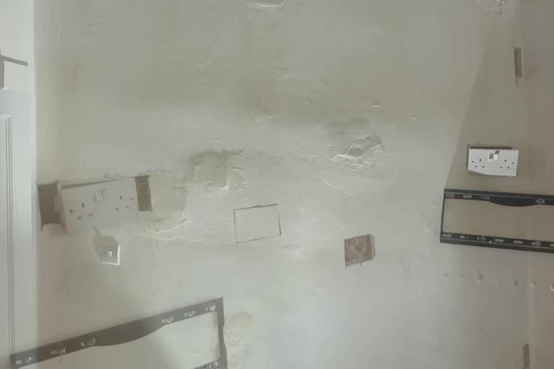 Wall filled and sanded, TV bracket still on