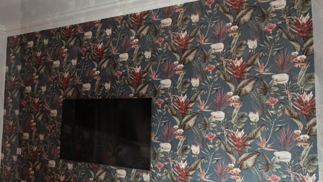 Floral feature wall with the TV remounted
