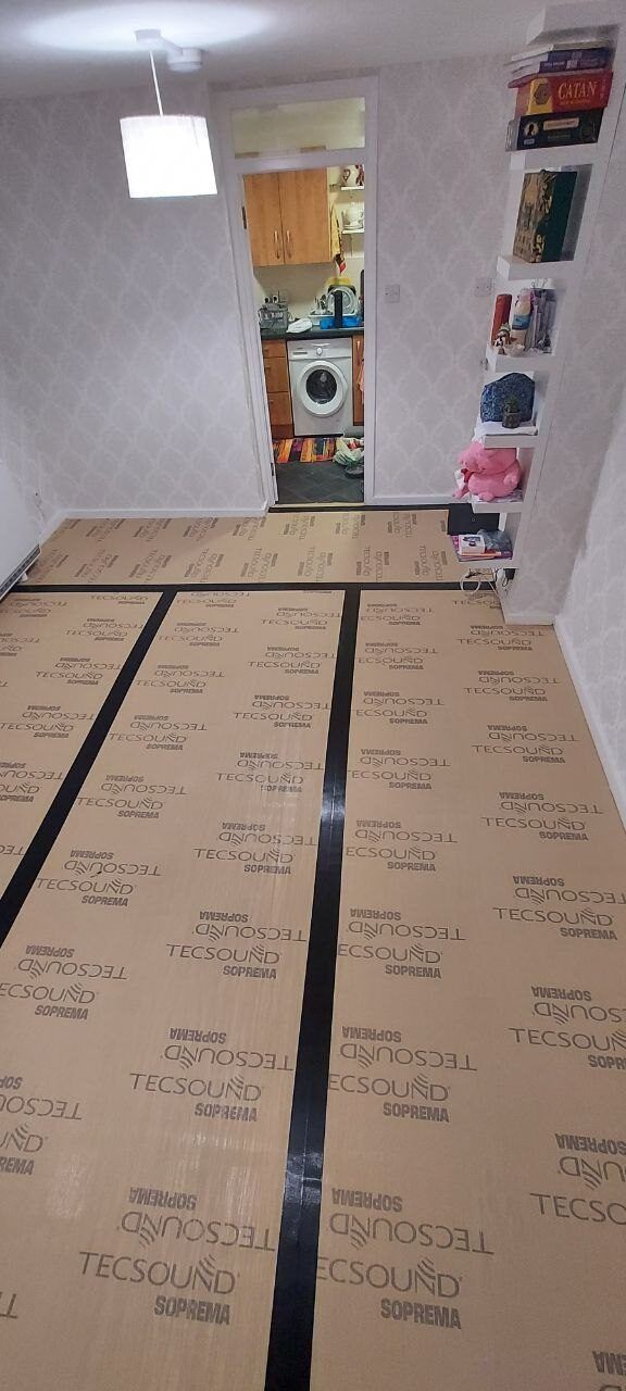 Living room floor covered with acoustic underlay